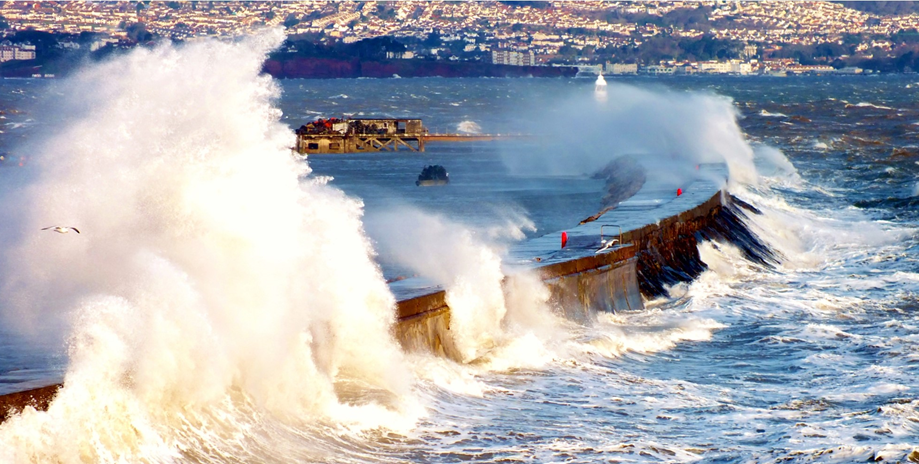 waves over a rock