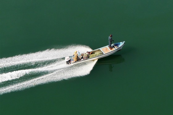 two people on a boat in sea