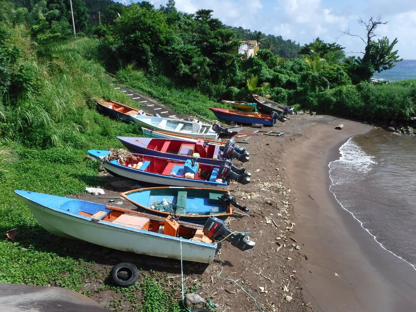 fishing boats on a beach in Dominica 