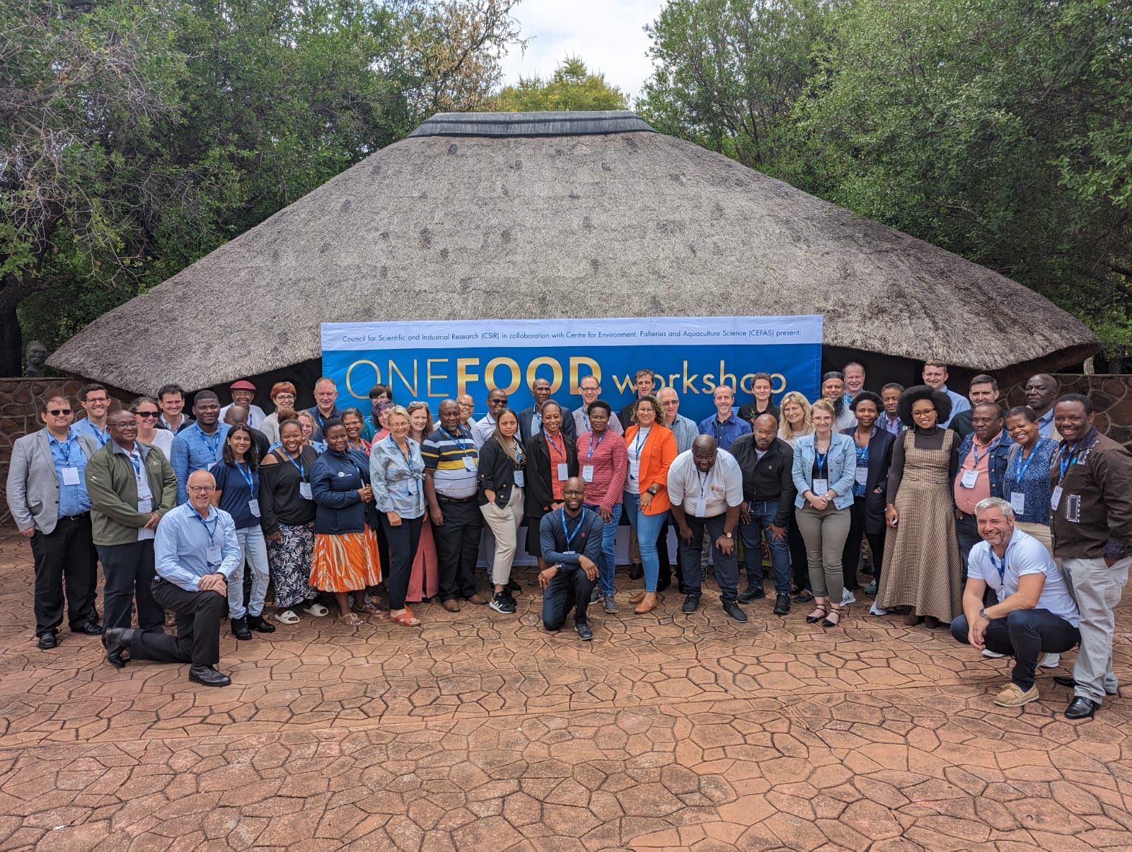 group from the conference outside the conference location in South Africa