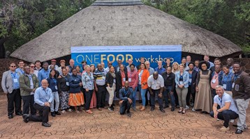 group from the conference outside the conference location in South Africa