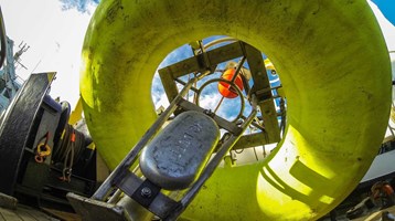 a smartbuoy - floatable scientific device - on the deck of a ship