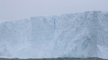 an iceburg in the sea