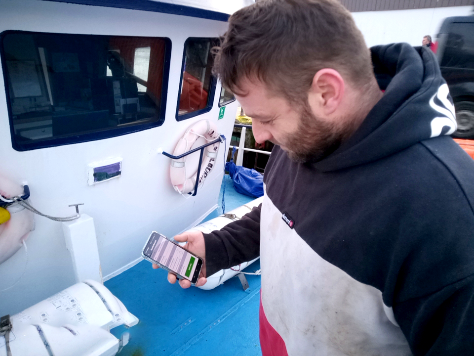 Ed Jones, skipper of the Rachel of Ladram tries out the new app for the first time.