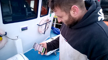 Ed Jones, skipper of the Rachel of Ladram tries out the new app for the first time.