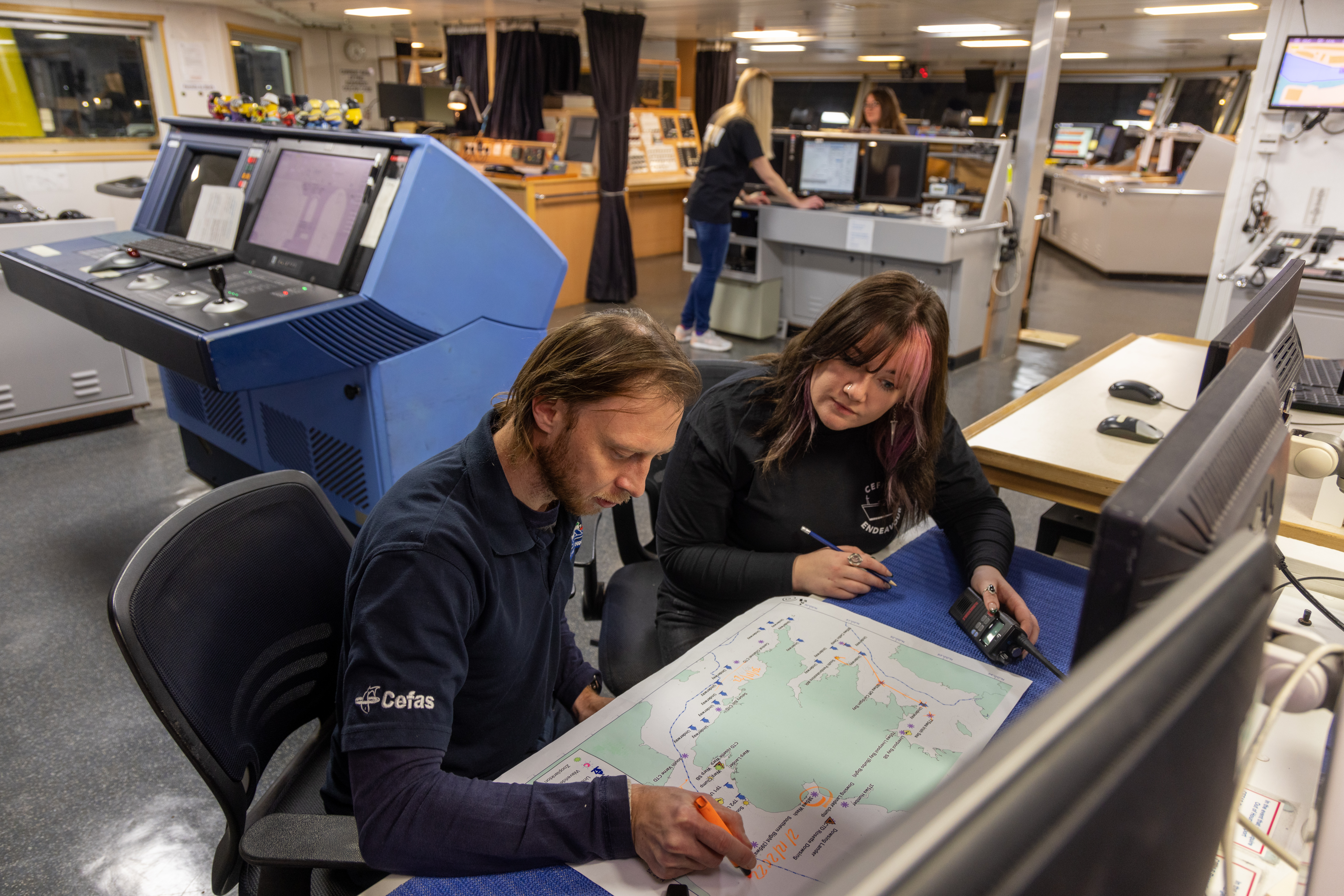 Two people looking at a map